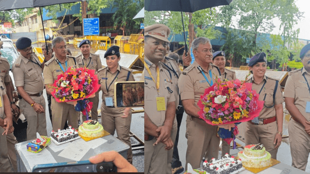Police Celebrate by Cutting Cake on Route of Modi’s Arrival